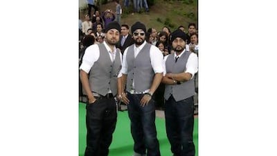 The RDB (Rhythm, Dhol, Bass) DJs, from left, Kuly, Manj and Surj Singh. Leon Neal / AFP Photo