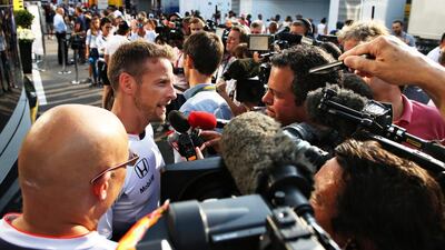 Jenson Button addresses the media following qualifying for the Italian Grand Prix where he announced he will not be racing the 2017 season. Charles Coates / Getty Images