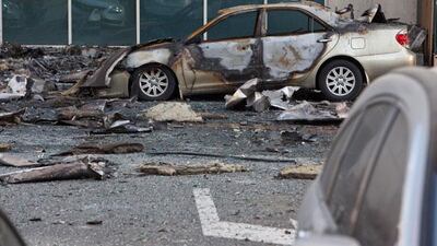 The blaze started on the roof of the 34-floor Tamweel Tower, and residents were evacuated around 2am as the fire spread down the facade of the building. Antonie Robertson / The National