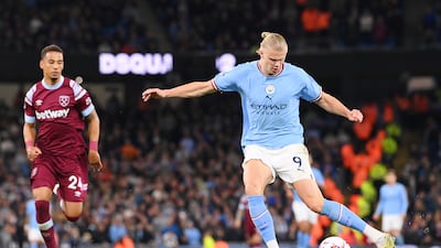 Erling Haaland scores for Manchester City. Getty