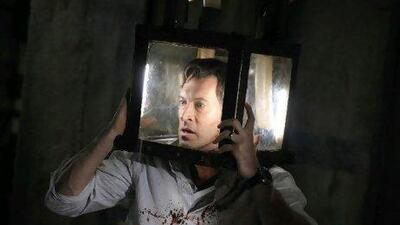 Agent Straum, played by Scott Patterson, finds himself in a tight spot in Saw V, which was directed by David Hackl, the production designer on the first four films.