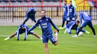 Argentina striker Gonzalo Higuain stretches during the team training session on Wednesday ahead of the Copa America final against hosts Chile on Saturday. Luis Acosta / AFP