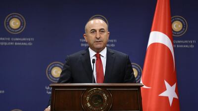 Turkish Foreign Minister Mevlut Cavusoglu gives a press conference in Ankara on July 25. AFP Photo