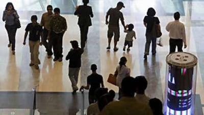 Customers at Abu Dhabi Mall must weigh the economic climate before embarking on a shopping spree.