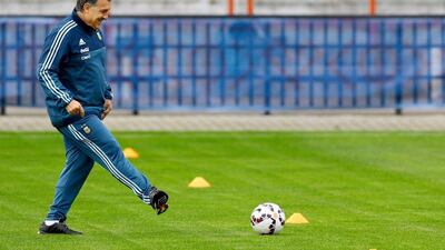 Argentina coach Gerardo Martino kicks the ball during Wednesday's training session ahead of the Copa America final on Saturday against Chile. Osvaldo Villaroel / EPA