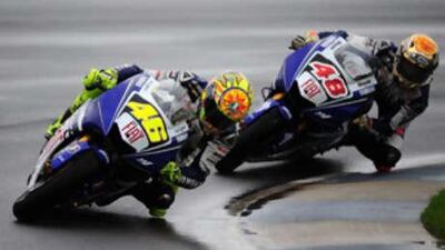 Valentino Rossi, left, leads his Fiat Yamaha teammate Jorge Lorenzo at the Indianapolis Grand Prix.