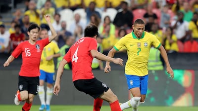 Richarlison takes on Kim Minjae during the game between Brazil and South Korea. Chris Whiteoak / The National