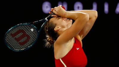 Aryna Sabalenka celebrates after beating Qinwen Zheng in the Australian Open final. Reuters