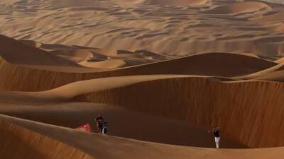 Luke Donald plays a shot among the sand dunes in Abu Dhabi's Liwa Desert.