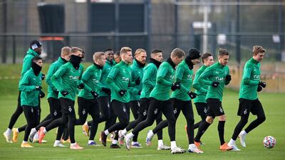 Monchengladbach players during training. EPA