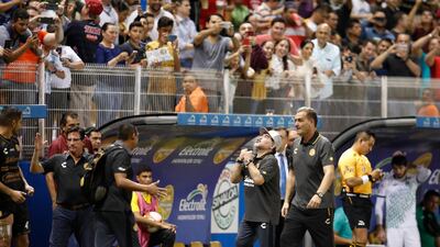 Maradona celebrates his team's 4-1 win. AP Photo