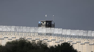 A watchtower near the wall. Reuters