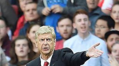 Arsenal manager Arsene Wenger watches his team against Crystal Palace during the English Premier League soccer match between Arsenal and Crystal Palace at the Emirates Stadium in London, Britain, 16 August 2014. EPA/ANDY RAIN
