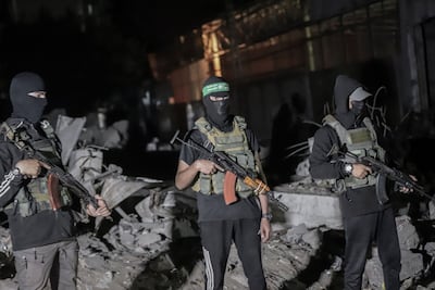 Palestinian militants wearing the uniform of the Al Qassam Brigades, the military wing of Hamas, in Gaza. Bloomberg
