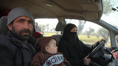 Displaced Ghossoon drive with her family in search of a shelter in the town of Maaret Misrin town in Syria's Idlib province after fleeing regime and Russian bombardment. AFP