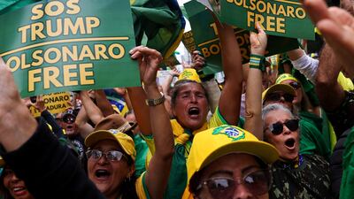 Supporters of Brazilian former president Jair Bolsonaro hold a protest on the the country's independence day, during the final phase of Mr Bolsonaro's coup trial. Reuters