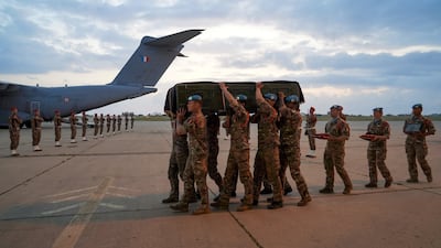 Members of the French military carry the coffin of Sergeant-Chef Florian Montorio. Haidar Fahs / UNIFIL /