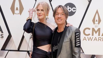 Nicole Kidman, left, and Keith Urban arrive at the 55th annual CMA Awards on Wednesday, Nov. 10, 2021, at the Bridgestone Arena in Nashville, Tenn. (AP Photo / Ed Rode)