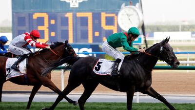 Christophe Soumillon rides Vazirabad to a third successive Dubai Gold Cup victory. Ahmed Jadallah / Reuters