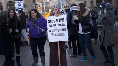 People protest against the New York Police Department programme that spies on Muslims. The NYPD has disbanded a surveillance unit that targeted and monitored Muslim communities. Reuters / November 18, 2011