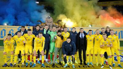 Ukraine coach Andriy Shevchenko and players celebrate at the end of the match. Ukraine beat Lithuania 2-0, leaving them needing a point to qualify for Euro 2020. Reuters