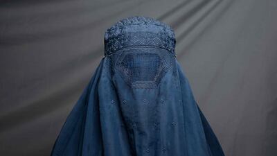 Shampoo factory worker Robina, 40, poses for a portrait in Kandahar. There is hardly a woman in the country who has not lost a male relative in successive wars, while many of their husbands, fathers, sons and brothers have also lost their jobs or seen their income shattered as a result of a deepening economic crisis.