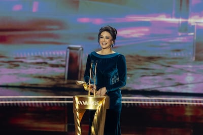 Karess Bashar accepts the award for Best Actress in a Series for Taht Sabi’ Ard at the 2026 Joy Awards. Photo: MBC Shahid
