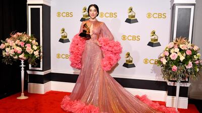 St. Vincent, winner of Best Alternative Music Album for 'Daddy's Home' poses in the press room. AFP