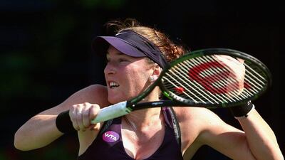 Madison Brengle of the USA hits a shot against Ekaterna Makarova of Russia during day one of the WTA Dubai Duty Free Tennis Championship at the Dubai Duty Free Stadium on February 15, 2016 in Dubai, United Arab Emirates. (Photo by Francois Nel/Getty Images)