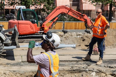 Construction workers in Europe have had their hours cut because of the heat. EPA