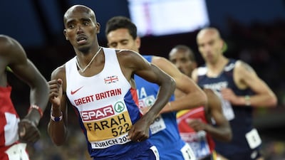 Mo Farah from Great Britain competes in the men's 10,000-metre final race, at the second day of the European Athletics Championships in the Letzigrund Stadium in Zurich, Switzerland, 13 August 2014. EPA/JEAN-CHRISTOPHE BOTT