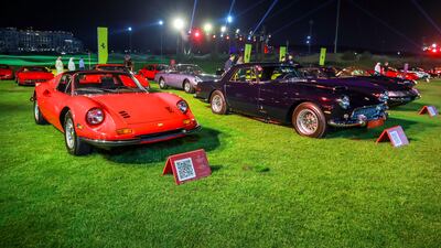 A Ferrari Dino sits next to a 250 GT
