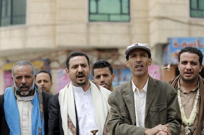 Members of the Bahai faith demonstrate outside a state security court during a hearing in the case of a fellow Bahai man charged with seeking to establish a base for the community in Yemen, in the country's capital Sanaa April 3, 2016. Reuters