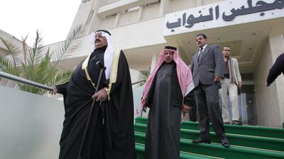 Jordanian MPs leave the parliament building in Amman. (Khalil Mazraawi / AFP Photo)