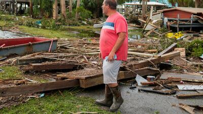 Buddy Ellison, 39, surveys his now destroyed shrimping business after Hurricane Idalia. Reuters