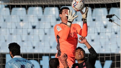 Real goalkeeper Thibaut Courtois catches the ball. AP