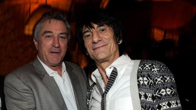 Robert De Niro and Ronnie Wood at the resort's Nobu restaurant during the opening weekend. Photo: Getty