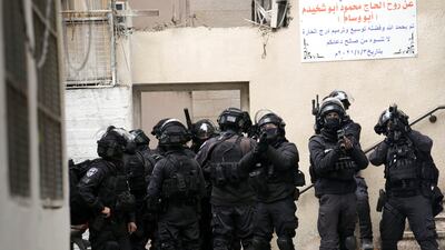 Israeli security forces in the Shuafat refugee camp in Jerusalem after family home of a Palestinian militant was demolished in February 2022. Photo: AP