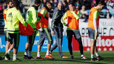 Newly appointed manager of Real Madrid Zinedine Zidane, centre, talks to his players during a Real Madrid training session at Valdebebas training ground on January 5, 2016 in Madrid, Spain. Gonzalo Arroyo Moreno/Getty Images