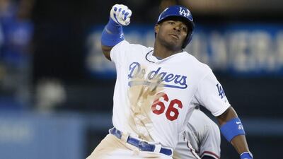 Yasiel Puig hit .471 in four games for the Dodgers in the National League Division Series. Danny Moloshok / AP