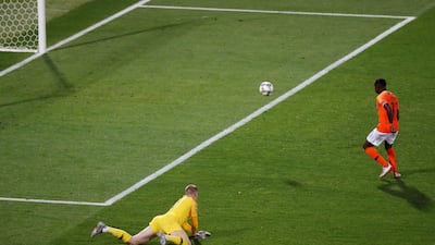 Promes scores their third goal. Reuters