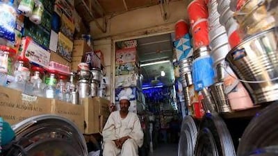A shopkeeper waiting for customers in Khartoum. REUTERS