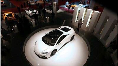 The Lotus Esprit was one of five new cars presented by the British sports car maker at the Paris Auto Show last year. Chris Ratcliffe / Bloomberg