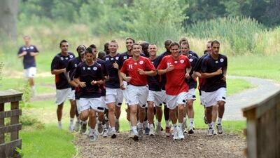 Lille players on a run alongside new coach Rudi Garcia on June 25, 2008 at Lille's training centre in Camphin-en-Pevele. AFP