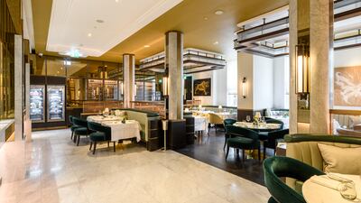 The open-plan venue has 32 tables and visible dry-aging vestibules