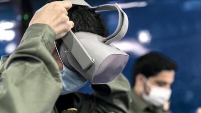 Cadets take a class at the Virtual Reality training room at Hamdan Smart Station for Simulation and Training. The station uses virtual reality and simulation technologies to provide comprehensive scenario-based emergency training. Reem Mohammed / The National