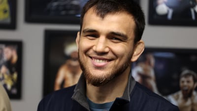 Bantamweight Kasum Kasumov smiles as he speaks to the media.