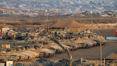 Israeli tanks gathered at an undisclosed location near the border with the Gaza Strip in southern Israel, on October 21. EPA