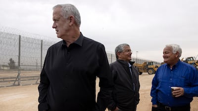 Israeli Defence Minister Benny Gantz, left, attends the ceremony.