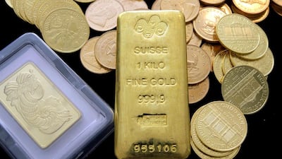 Gold, including coins such as South African Krugerrands – part of the mix shown in this picture – is trading at around US$1,200 an ounce. Nick Ut / AP Photo